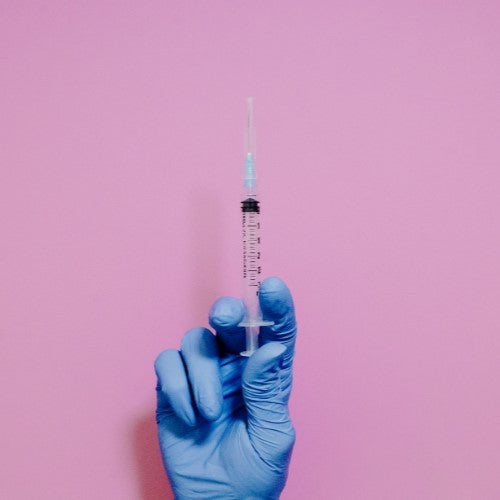 syringe in a hand
