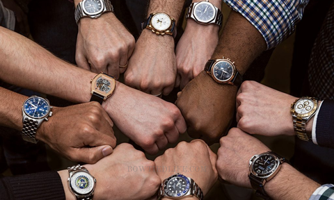 Men showing their luxury watches