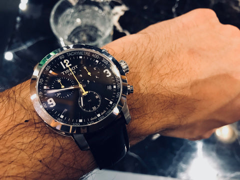 Tissot Quartz Watch on a man's wrist