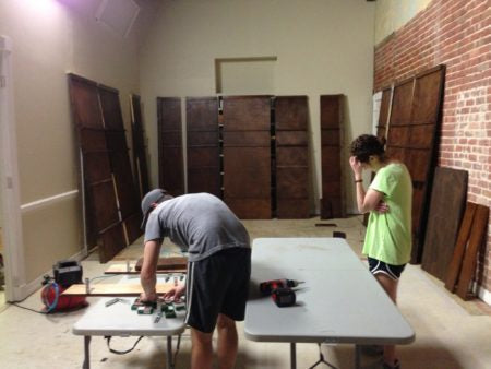 Neil and Dani helping build the walls for our booth at the 2013 National Stationery Show!