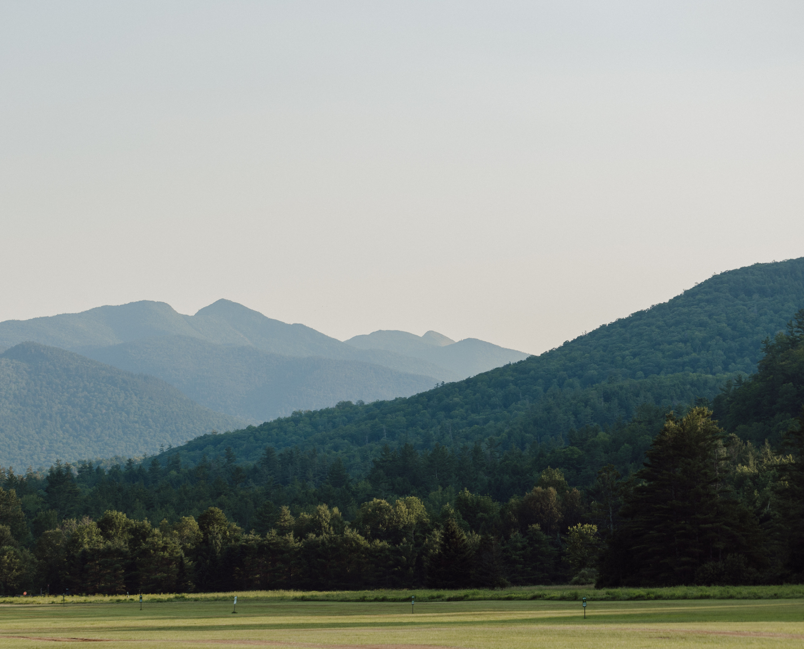 A professional photo of the woodsy Adirondack Mountains taken by Rebecca Loomis | Rebecca Loomis Photography for Weddings and Branding