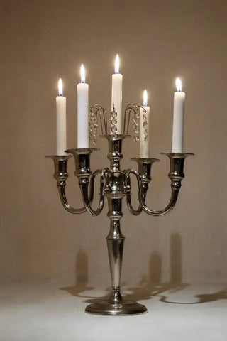 Lit candles on a table