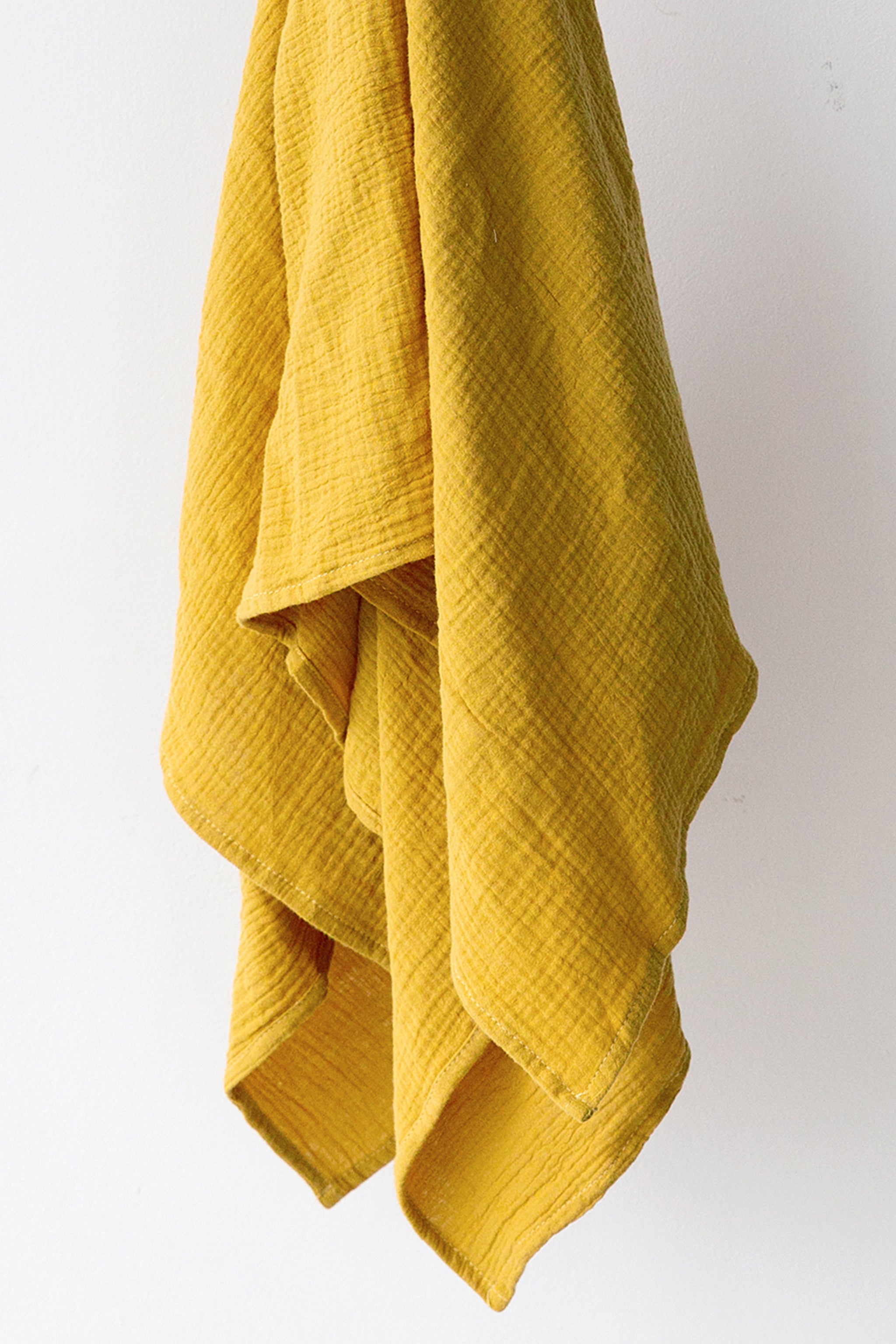 yellow muslin blanket