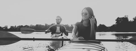 couple moonlight kayaking