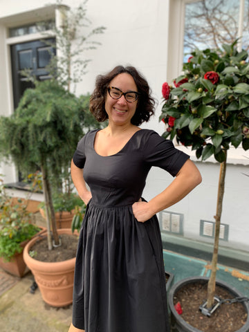 Woman in black dress