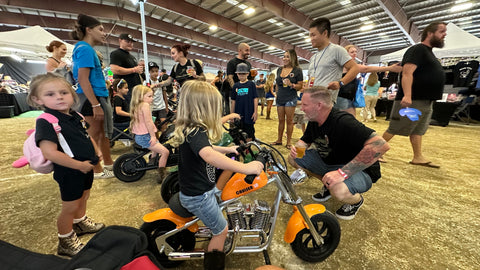 HYPER GOGO Kids Electric Bike surrounded by the family