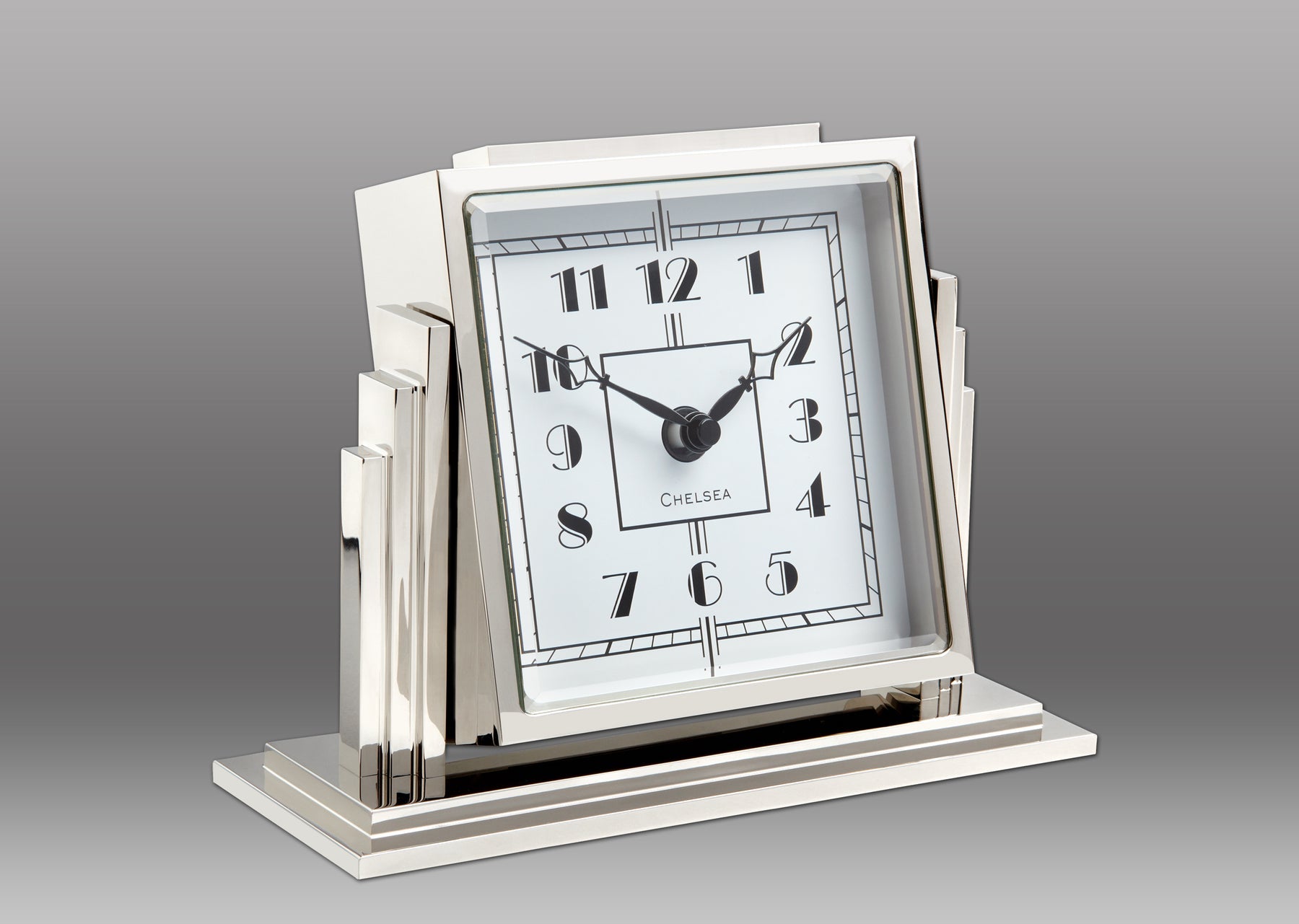A clock with a white face Description automatically generated
