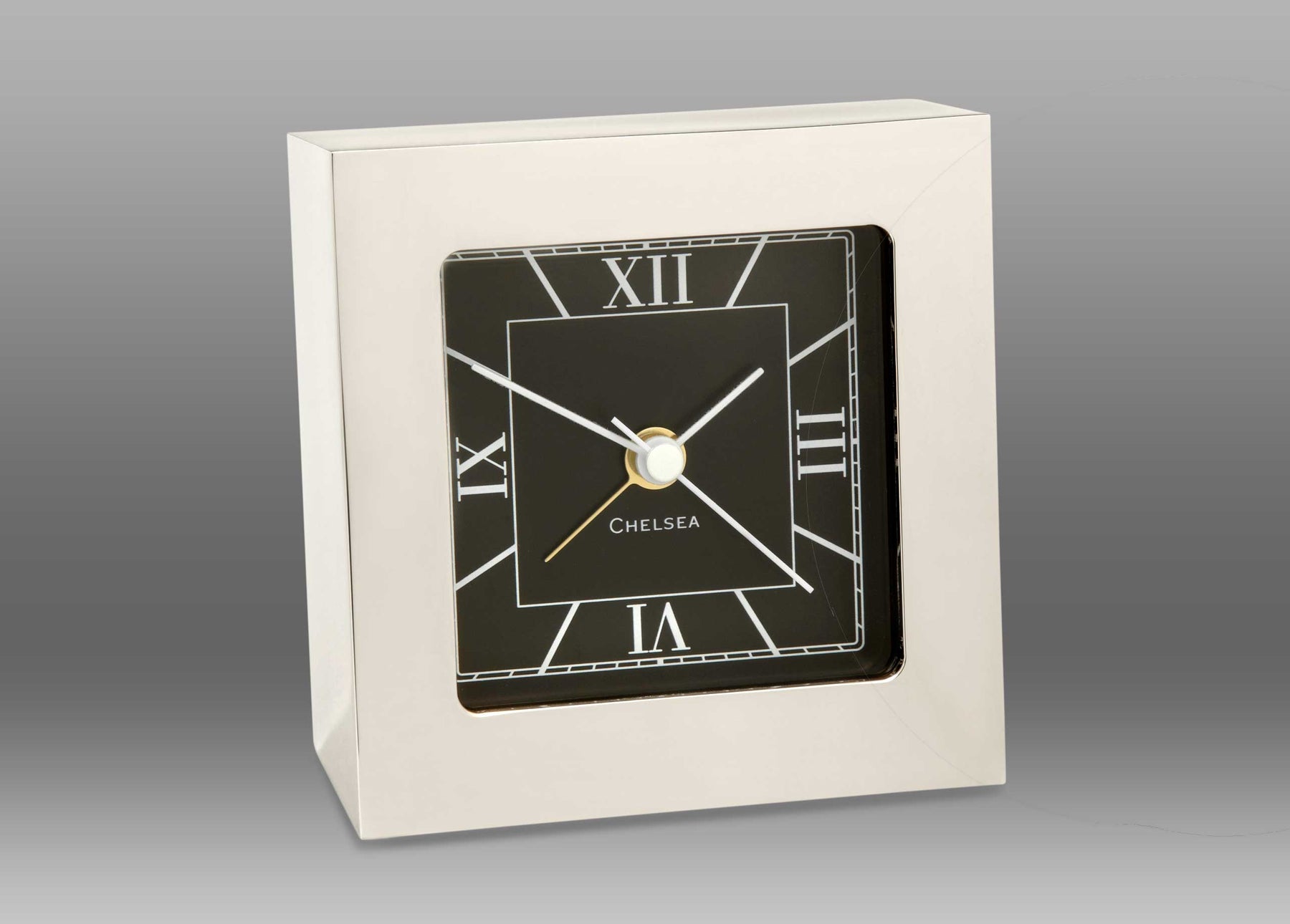A black and white clock Description automatically generated