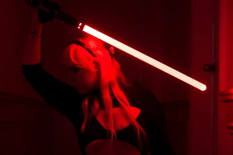 Star Wars fan wields lightsaber