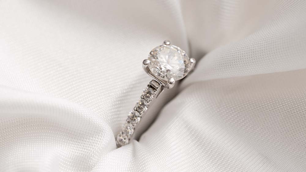 Ethica white gold and moissanite engagement ring.