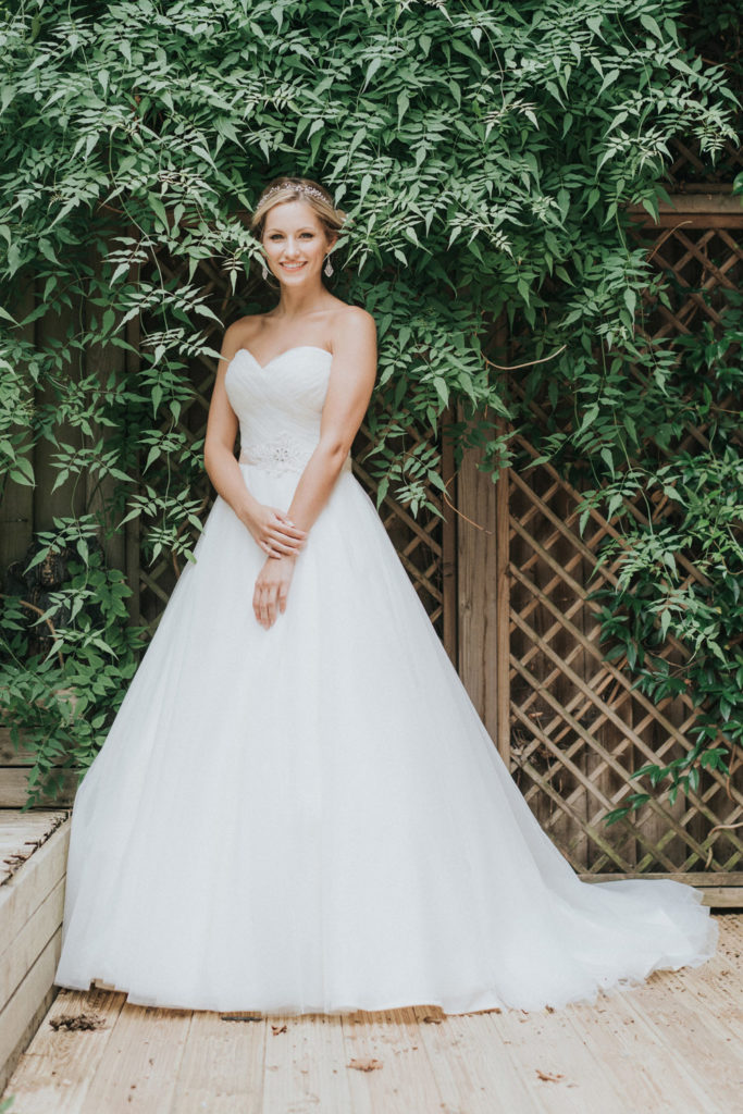 Model wearing a white wedding dress