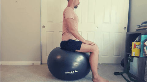 how to sit on a fit ball correctly