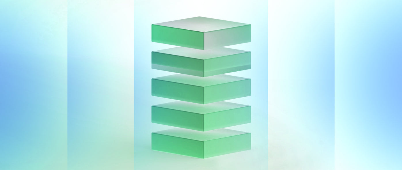 Stack of green translucent blocks ascending in size on a gradient background.