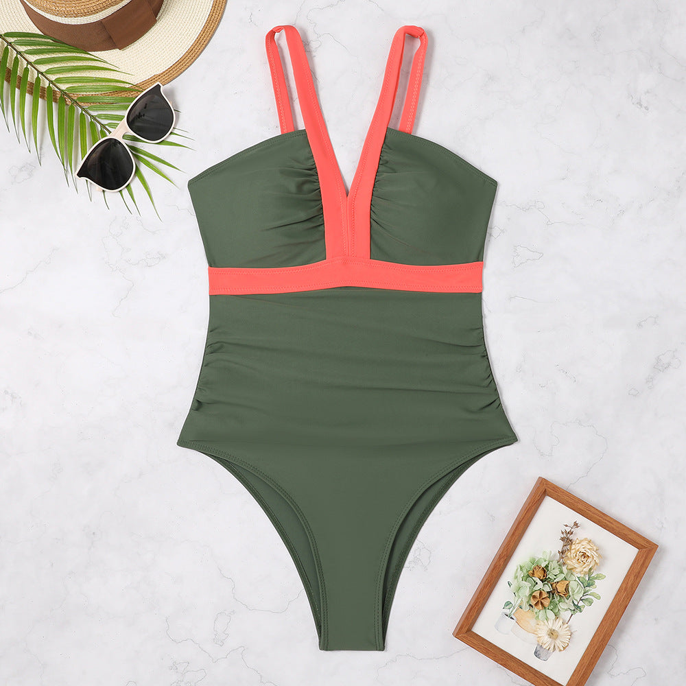 Product Image for Damer Én-delt Badeshorts med elegant V-hals og figurformende volanger Ravikna, Grønn / M