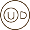 Brown circular logo with the letters 'U' and 'D' enclosed within.