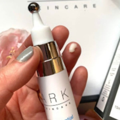Product image of ARK Skincare's Reverse Gravity Eye Cream next to a branded ARK Skincare box. 