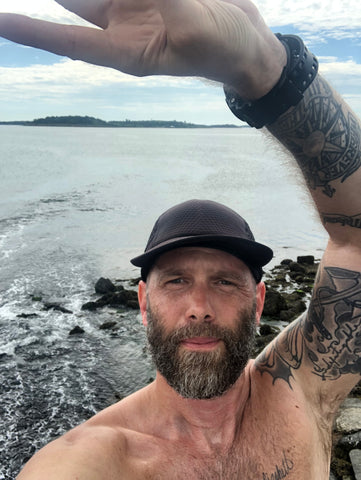 I find this a stunning picture of Ben His half villainous half reliable  gaze the beard his hat the tattoos I think this man could become a  Survivor icon  rsurvivor