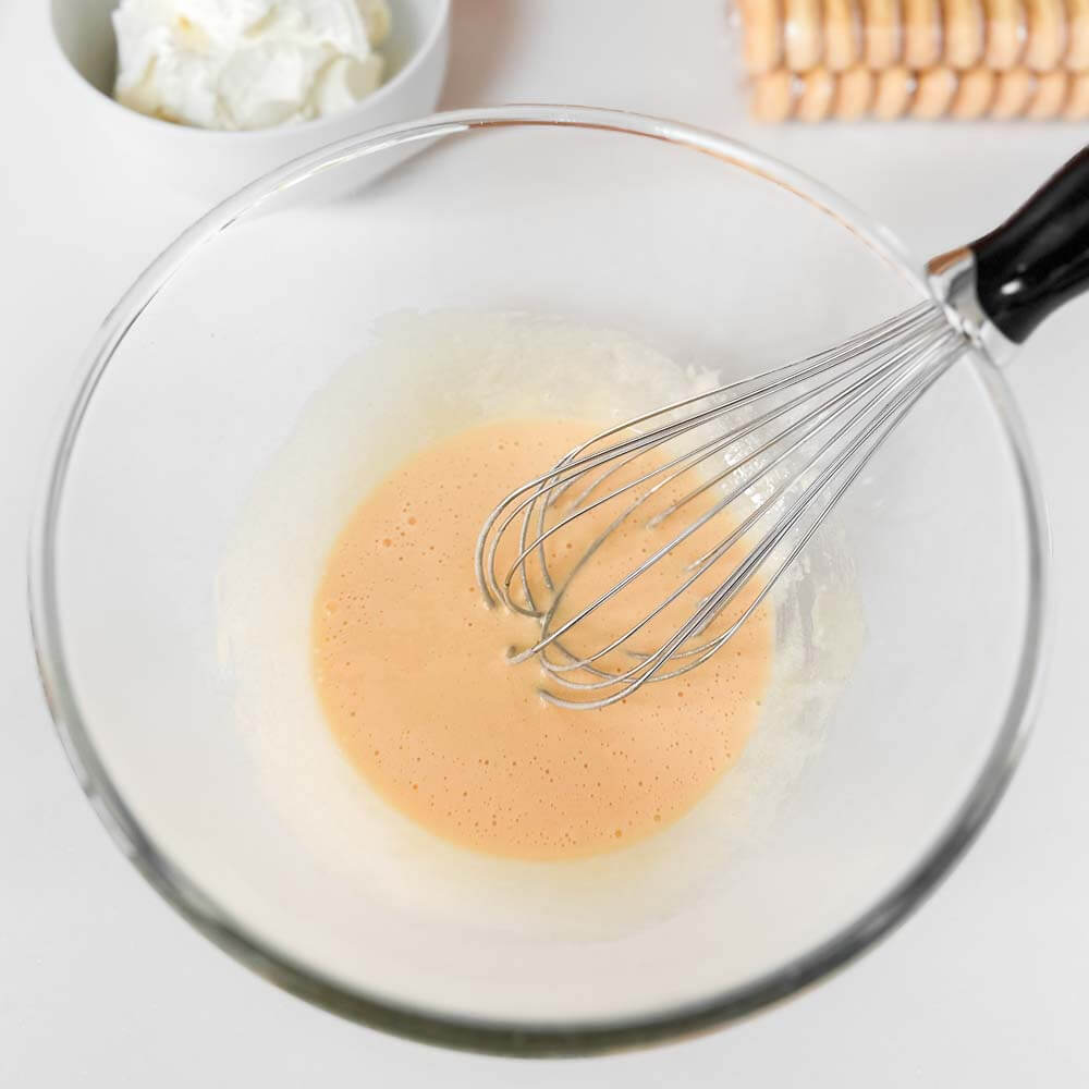 Whisk egg yolks until light and smooth