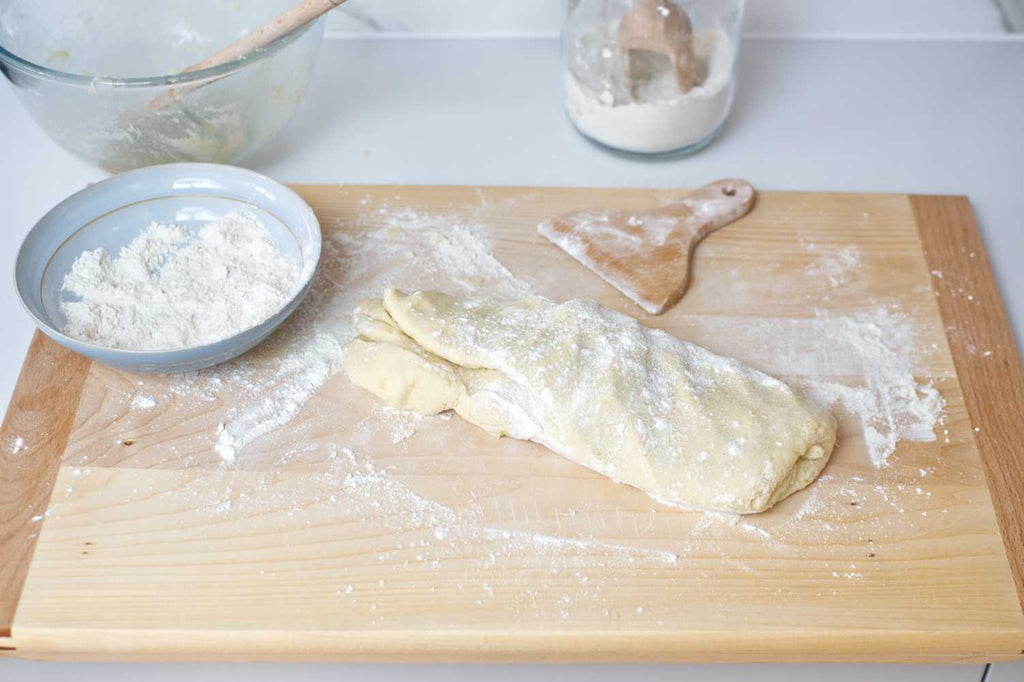 Gradually mix the flour into the gnocchi dough