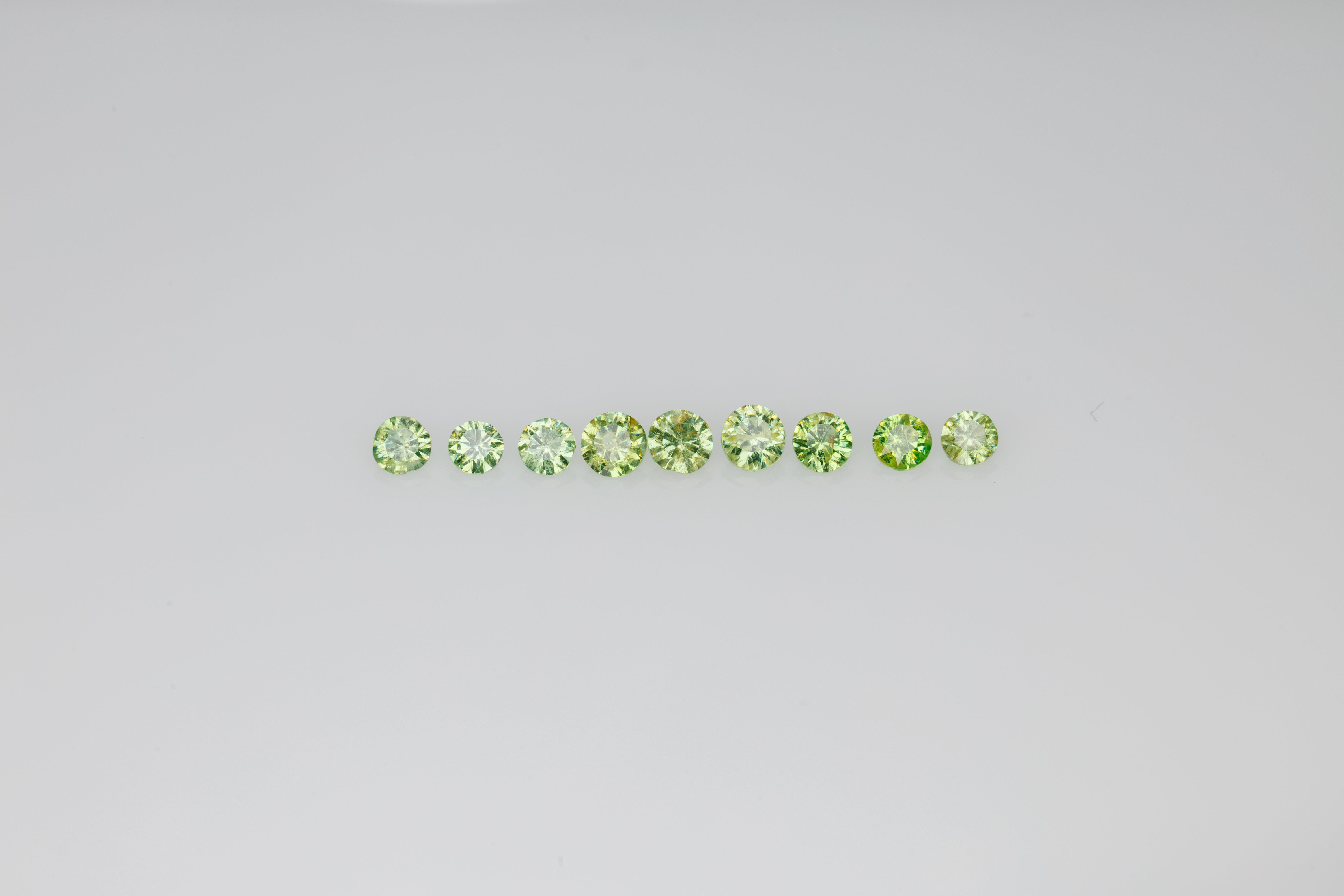 Faceted demantoid garnet set 0.85 ct