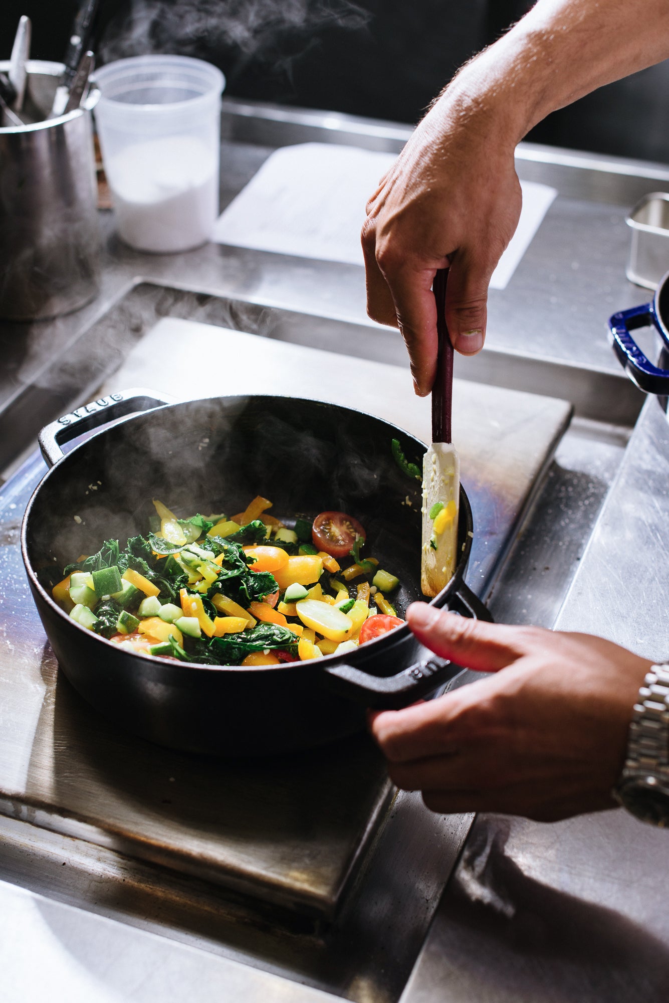 Veggies sizzle on George Mendes's stove.