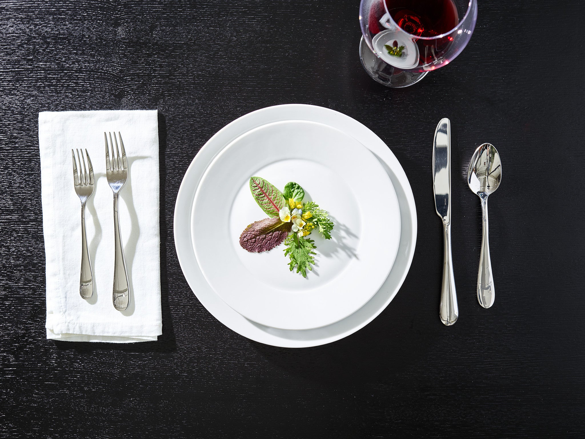 place setting featuring a contemporary salad