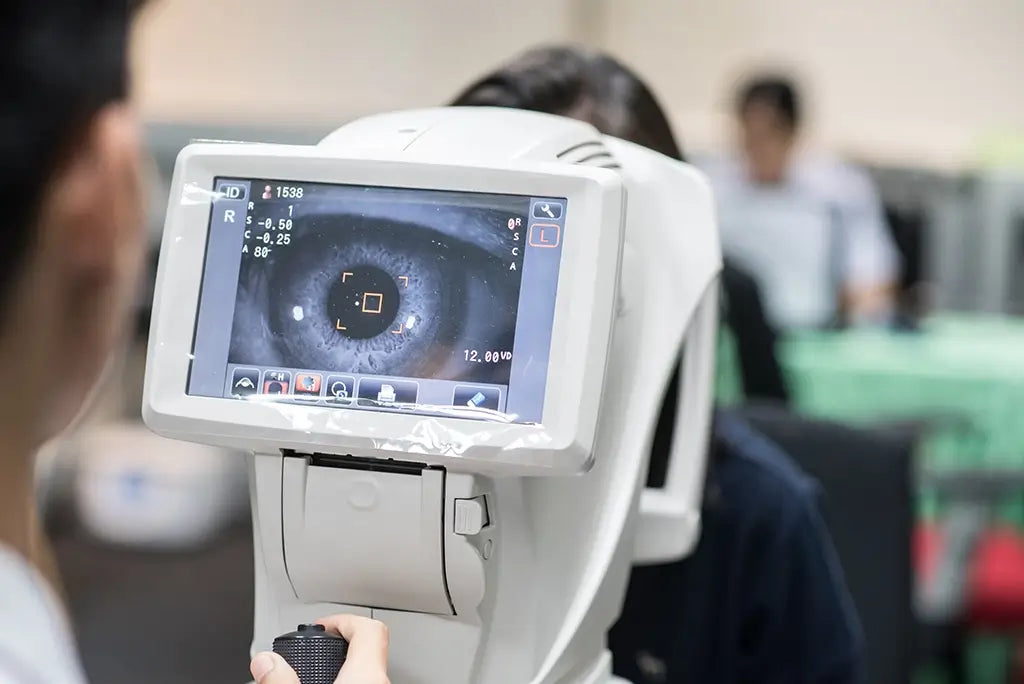 woman at they eye doctor having her eyes checked