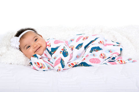 swaddled baby with solved sleep problems