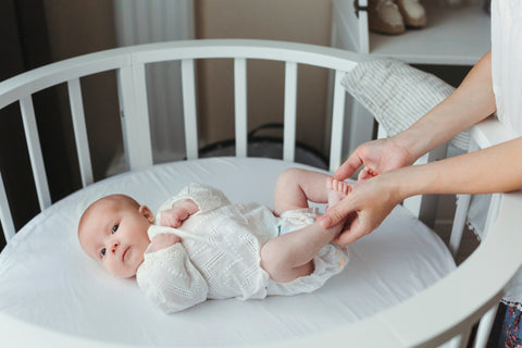 parent reduces baby startling with the perfect bedroom atmosphere