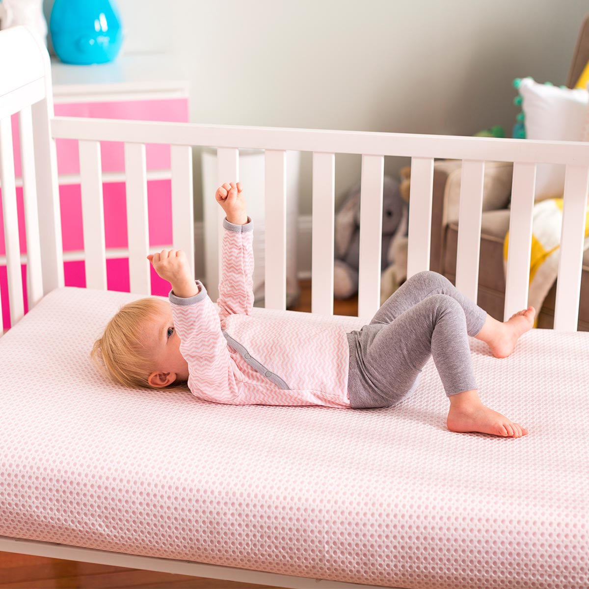 2 mattresses in crib