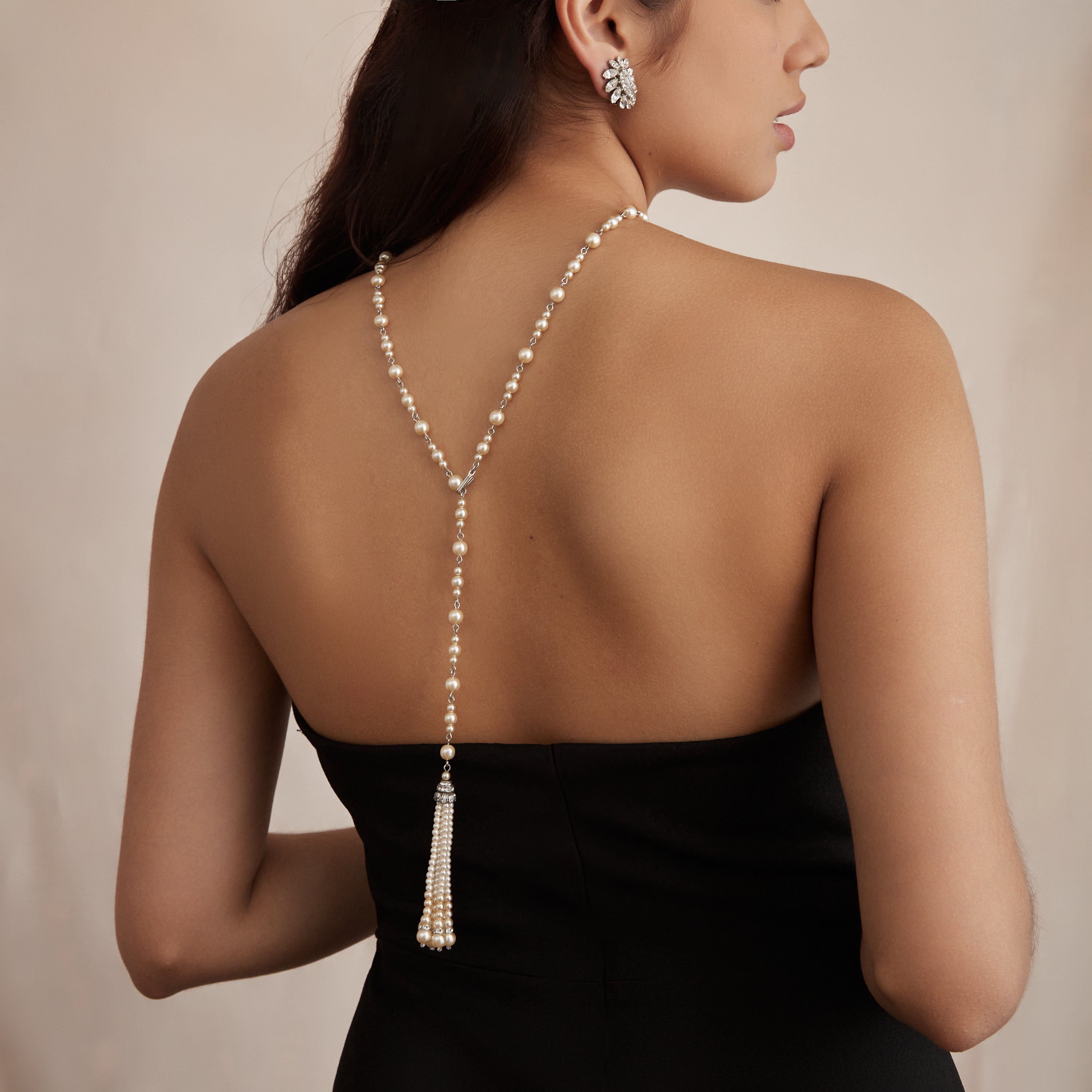 Pearl back necklace on bridesmaid