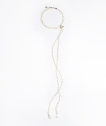 Custom long pearl necklace with crystal detail worn by Sarah Jessica Parker, placed on white background
