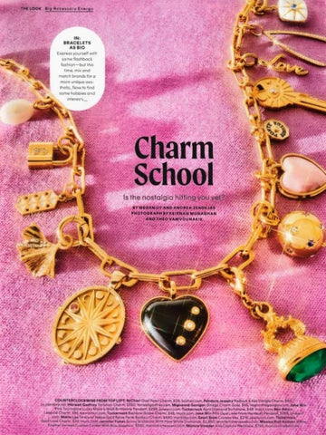 Cosmopolitan magazine features Ben Amun's Charm in front of a pink velvet background