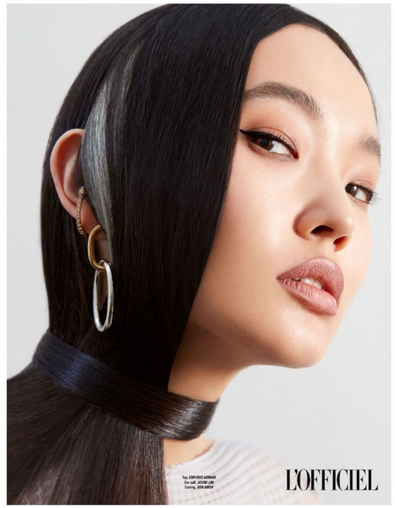 Model wears Ben-Amun earrings