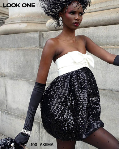 Model in crystal bracelet and earrings walking on street