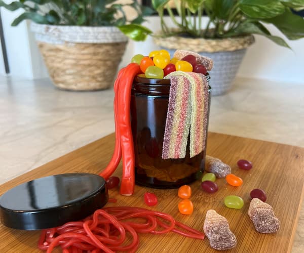 Use your empty candle jars to store your favourite sweet treats