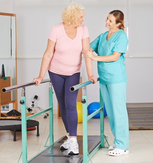 Physiotherapy with walking exercise on treadmill for senior woman