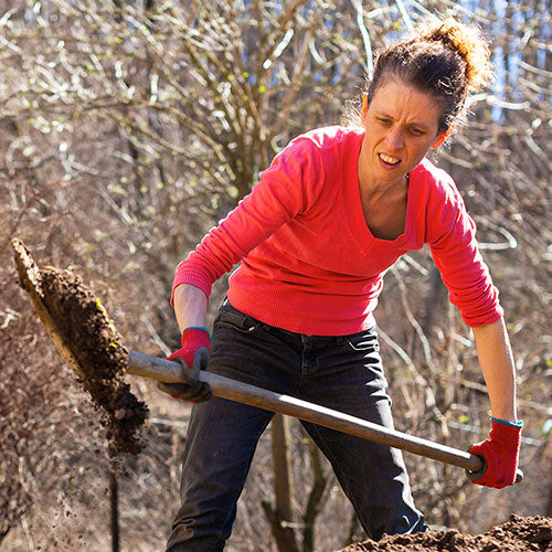 woman digging in the garden