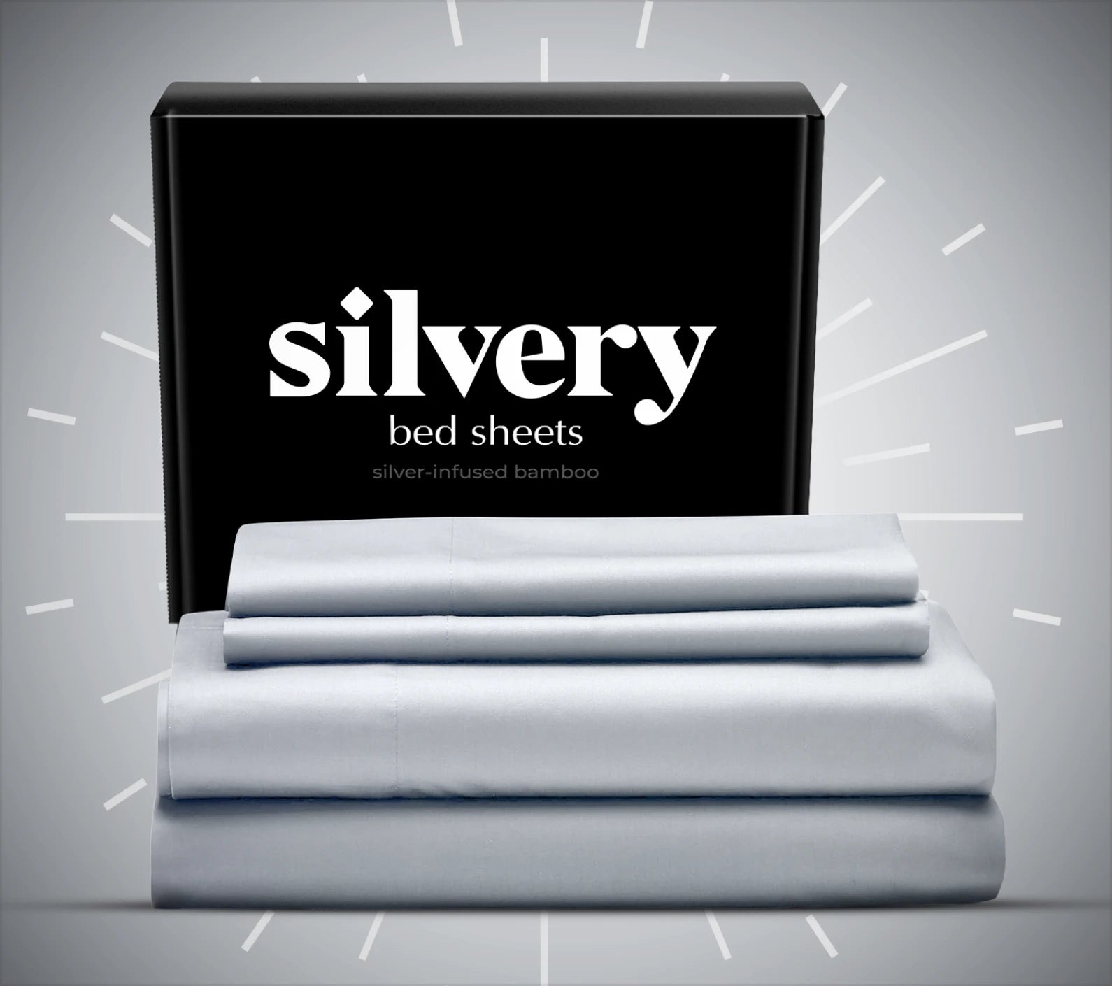 Silver-colored bed sheets with a 'Silvery' branded box in the background.