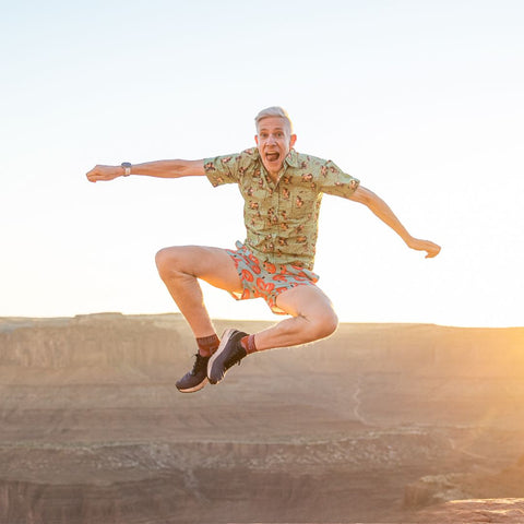 Caffeine Bullet Founder Jumping In the Mountains