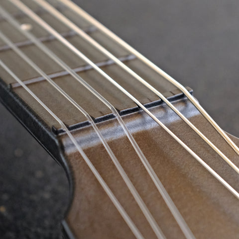 Outdoor Guitar String Slots