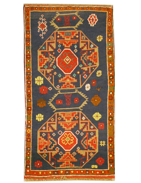 BALOUCH NOMAD RUG FROM THE HANDMADE RUG COMPANY