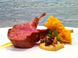 Lamb rack recipe with harissa, brioche, and puffed wild rice!