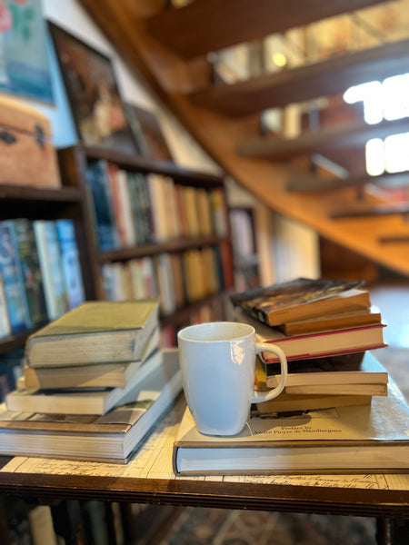 coffee cup in a beautiful library