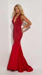woman in red jasz couture prom dress