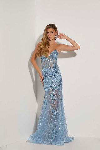 Woman in light blue glittered prom dress by jasz couture featuring a corset bodice and sheer skirt