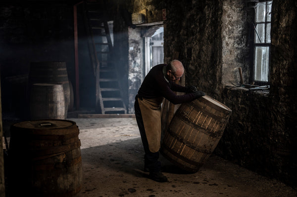 A cooper working on a cask