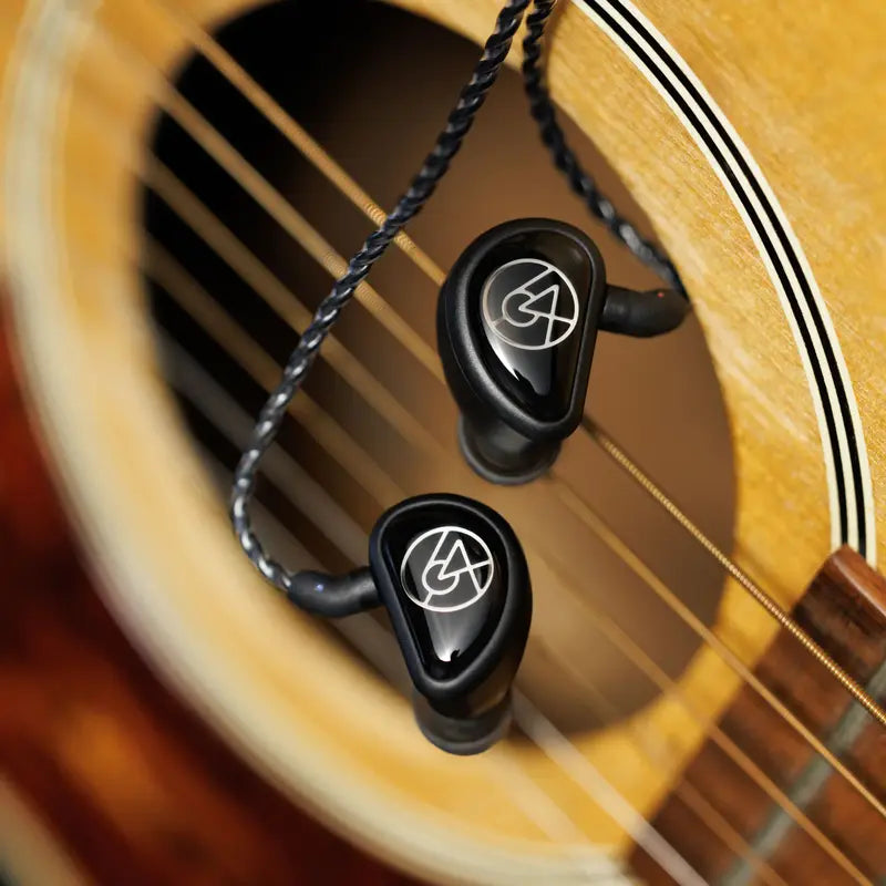 64 audio spire 4 iem front view hanging off guitar strings