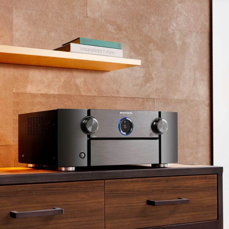 marantz sr7015 av receiver front angled view on wood cabinet