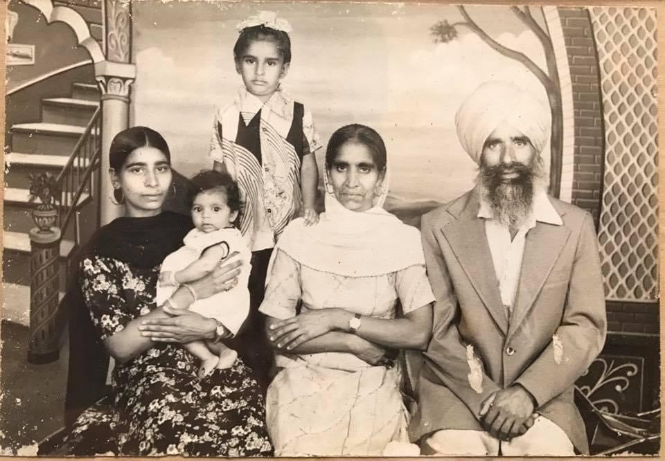 This is the only photo from Gurdeep's childhood with his mom and dad. His hand on his mom's shoulder says everything. To his right is his oldest sister (with her daughter), who, along with his other sisters, took care of him when his mom had to spend a full year in the hospital after he was born.